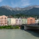 Colourful houses by the river during summer in Innsbruck