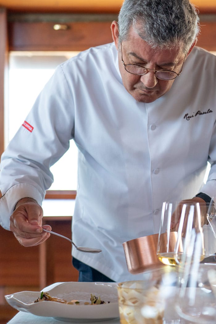 Chef Rui Paula adds the finishing touches at the table